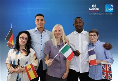 Camozzi employees with flags from different nations